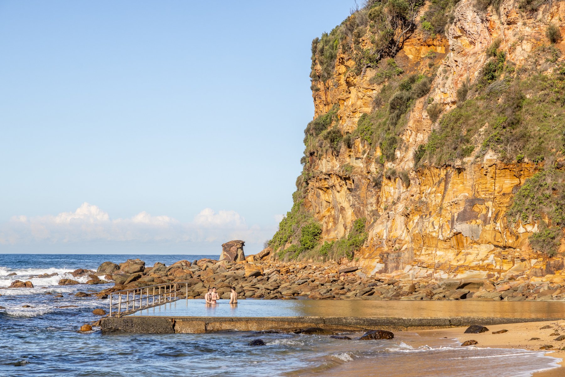3 boys swimming in the rock pool at MacMasters Beach on the Central Coast